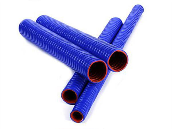 4 flexible silicone hoses with steel helix.