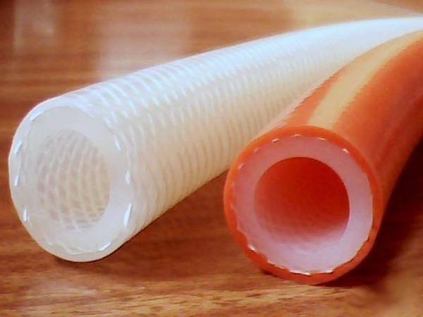 Silicone braided hose in semi opaque white and orange color