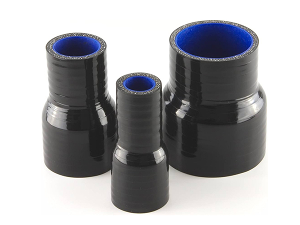 Three black straight silicone reducer hoses of different thicknesses are placed vertically on a white background.