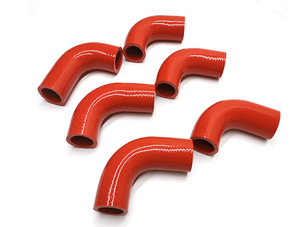 6 red 120° silicone elbow on a white background