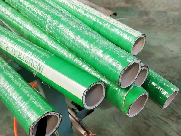 7 acid and alkali resistant rubber hoses with white labels on the shelf