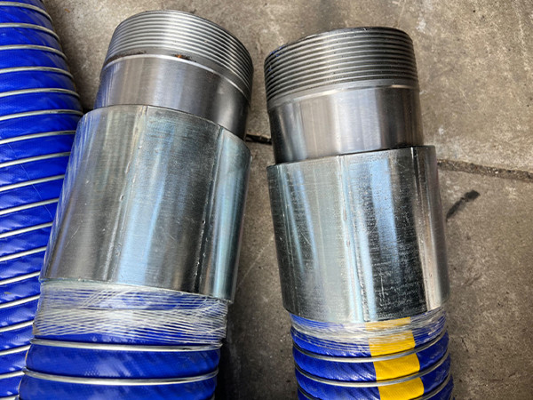 Composite hose with external fitting