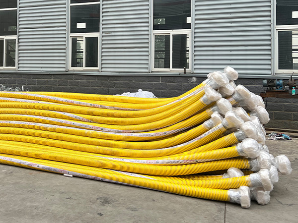 Yellow composite hose packaged in plastic film
