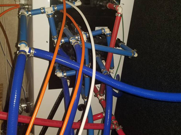 Fiber reinforced nylon resin hose used for control systems