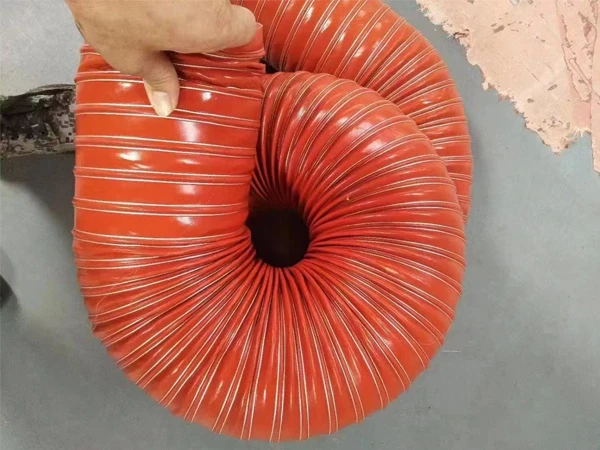 A large orange-yellow high temperature silicone duct hose
