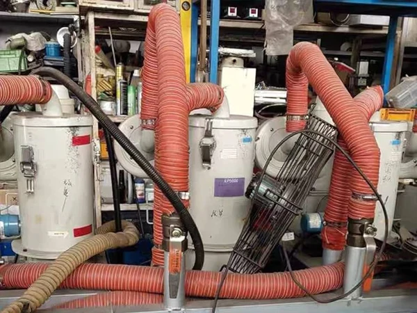 An orange-yellow high temperature silicone duct hose for corrosive gas delivery