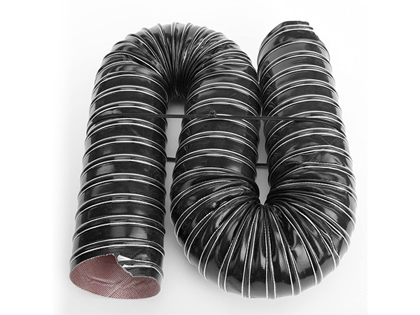 A black high temperature silicone duct hose placed on a flat surface