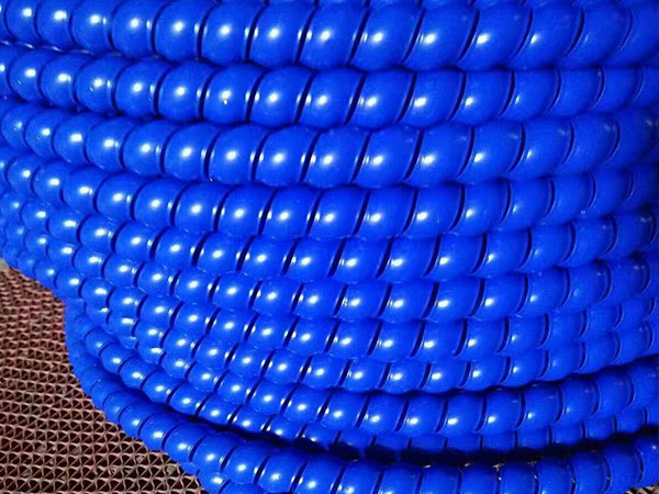 A set of blue hydraulic hose plastic spiral protector