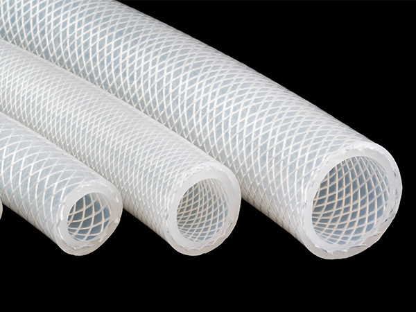 Three food grade silicone hoses of different thicknesses on a black