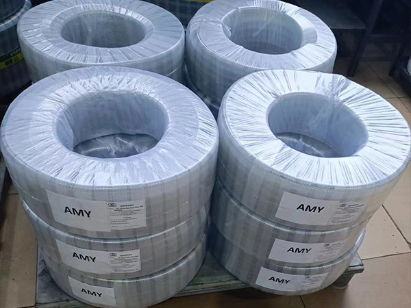 Packed 12 PVC steel wire reinforced hoses are placed in the trolley