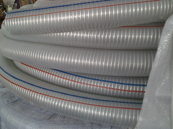 Processed transparent PVC steel wire reinforced hose stored in warehouse