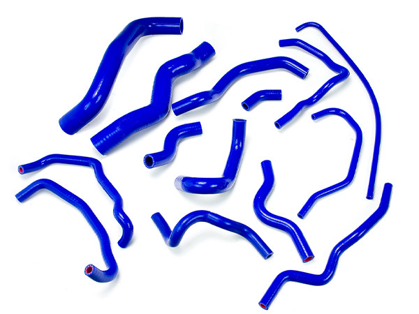 Blue silicone hose car kits of different shapes and sizes on a white background